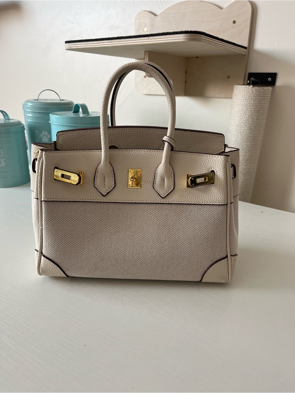 Elegant Cream Structured Top-Handle Tote with Gold Hardware
